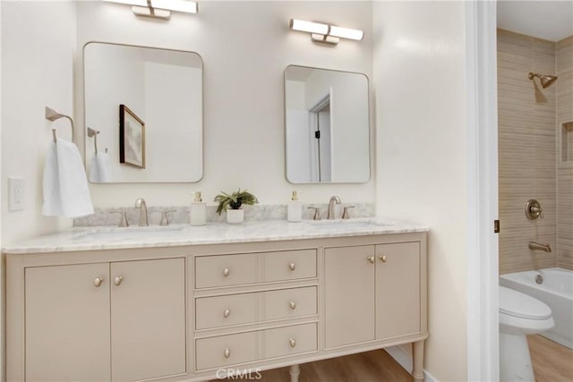 2583 King Way, Claremont, CA 91711 - bathroom with a sink, toilet, double vanity, and shower / washtub combination