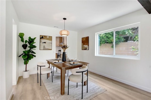 2583 King Way, Claremont, CA 91711 - dining area with baseboards, light wood-style flooring, and visible vents