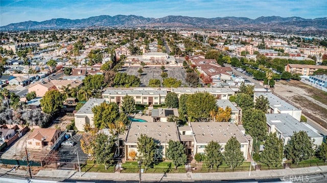 drone / aerial view with a residential view and a mountain view
