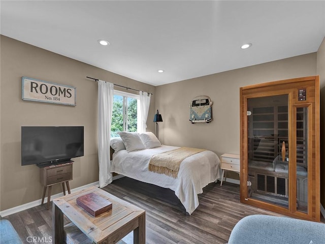 bedroom featuring recessed lighting, baseboards, and dark wood-style floors
