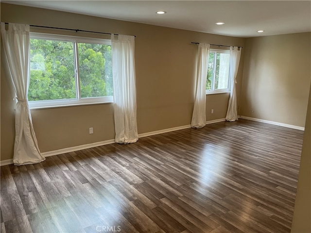 11813 Runnymede St Unit 44, North Hollywood, CA 91605 - unfurnished room with dark wood-type flooring, baseboards, and recessed lighting