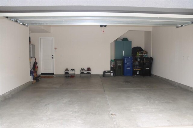 4211 E Malagon Privado Unit 66, Ontario, CA 91761 - garage with a garage door opener