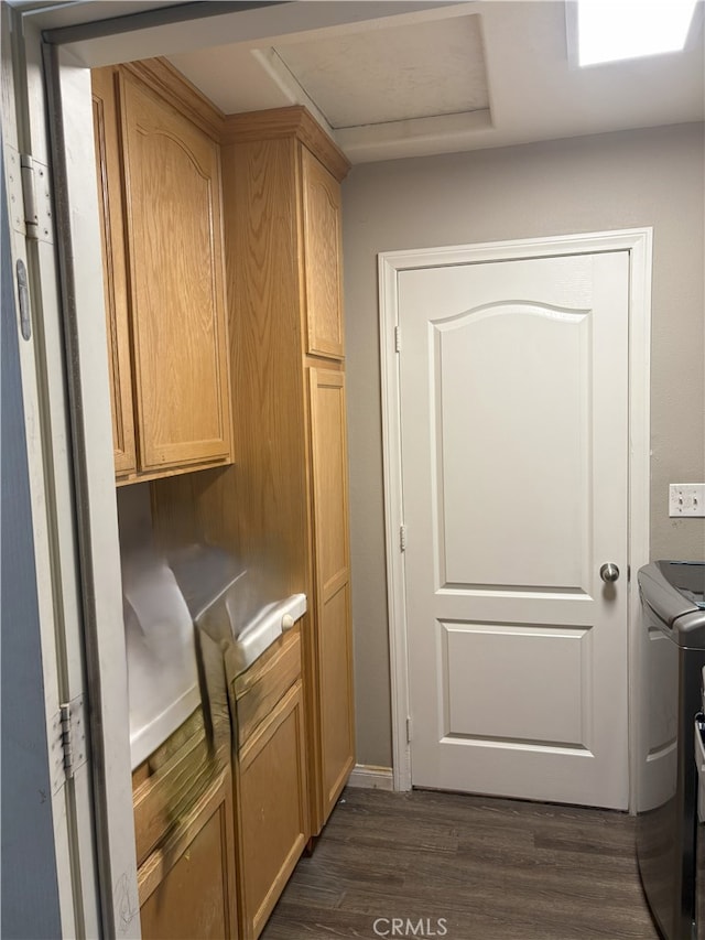 7548 Chase Ave, Hesperia, CA 92345 - laundry room with independent washer and dryer, cabinet space, dark wood finished floors, and attic access