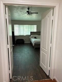7548 Chase Ave, Hesperia, CA 92345 - bedroom with baseboards, dark wood-type flooring, and ceiling fan