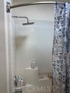 7548 Chase Ave, Hesperia, CA 92345 - full bath featuring a shower with curtain