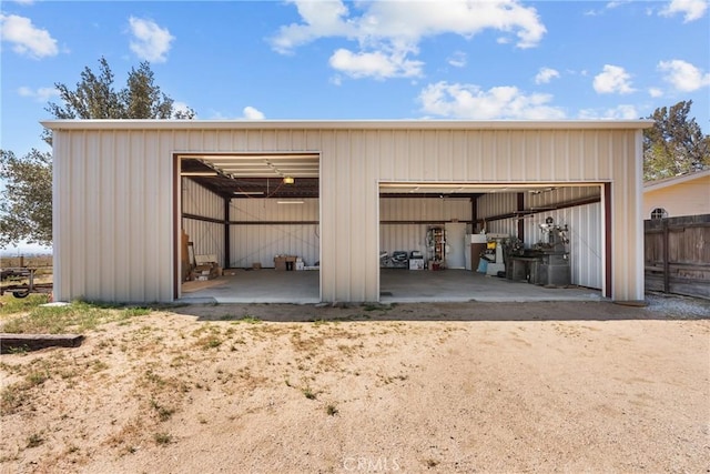detached garage with fence