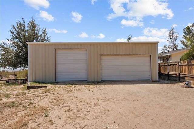 detached garage with fence