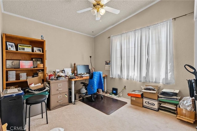 office with carpet floors, a textured ceiling, a ceiling fan, vaulted ceiling, and ornamental molding