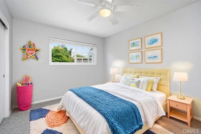 carpeted bedroom with baseboards and ceiling fan
