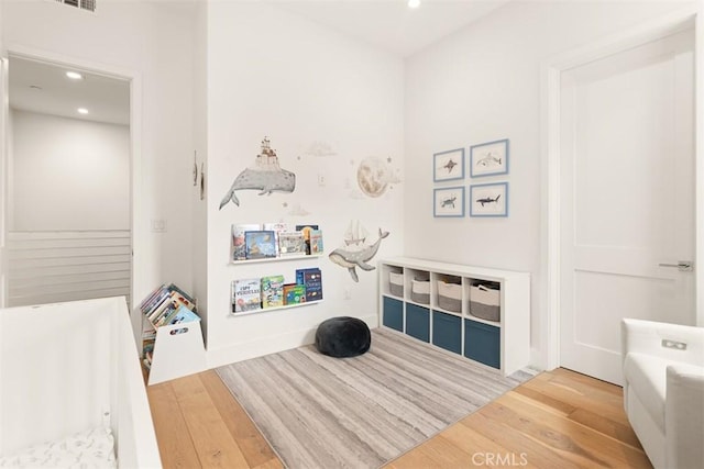 4322 Gentry Ave Unit 104, Studio City, CA 91604 - recreation room featuring recessed lighting, hardwood / wood-style flooring, and visible vents