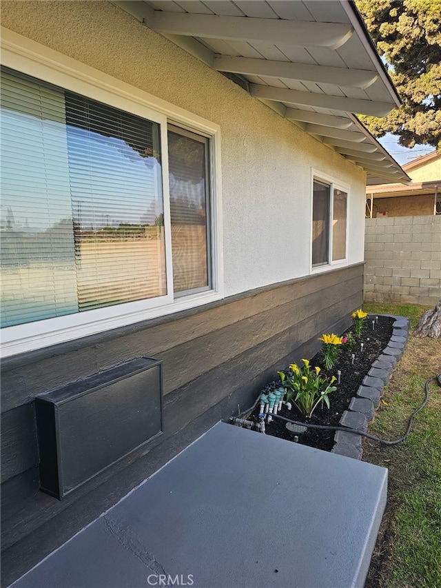 4832 Olive St, Montclair, CA 91763 - view of home's exterior featuring stucco siding and fence