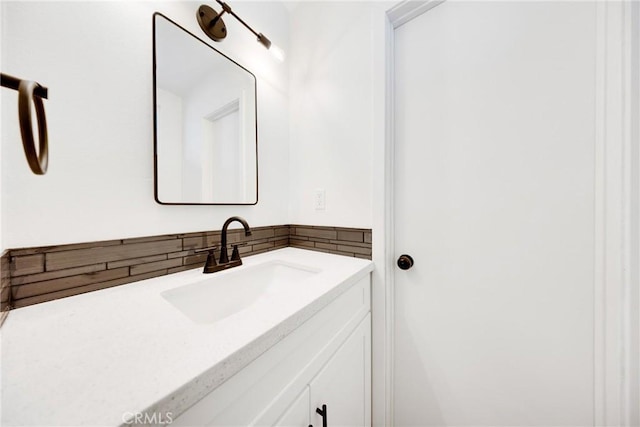 4832 Olive St, Montclair, CA 91763 - bathroom featuring vanity and backsplash