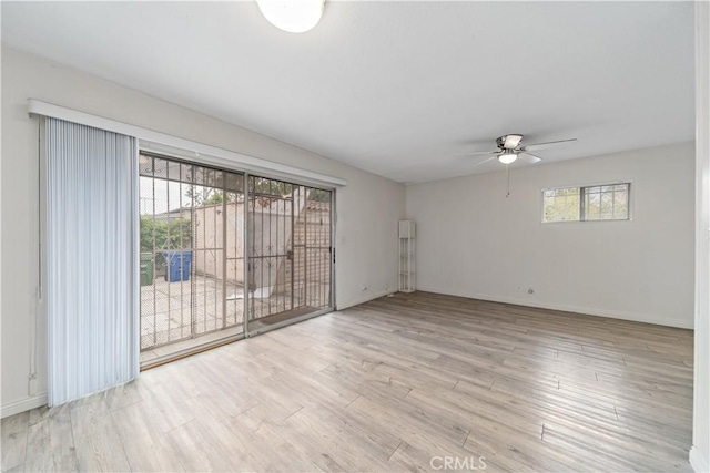 3712 Virginia Rd, Los Angeles, CA 90016 - unfurnished room with baseboards, a ceiling fan, and wood finished floors