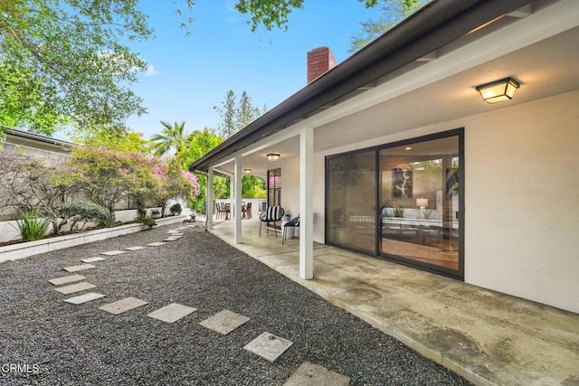 view of patio featuring fence