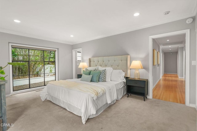bedroom with crown molding, recessed lighting, baseboards, and light carpet