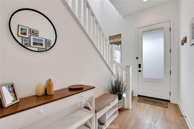 2446 E Encanto Paseo, Ontario, CA 91762 - entryway featuring light wood-style floors and stairs