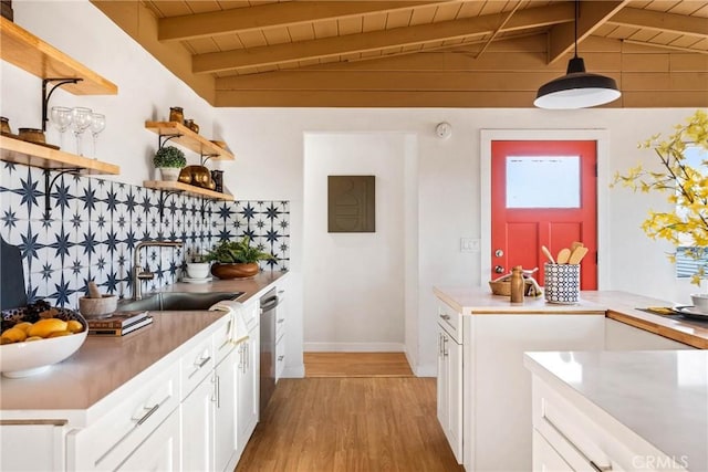 kitchen with open shelves, dishwasher, wooden ceiling, vaulted ceiling with beams, and light wood-type flooring