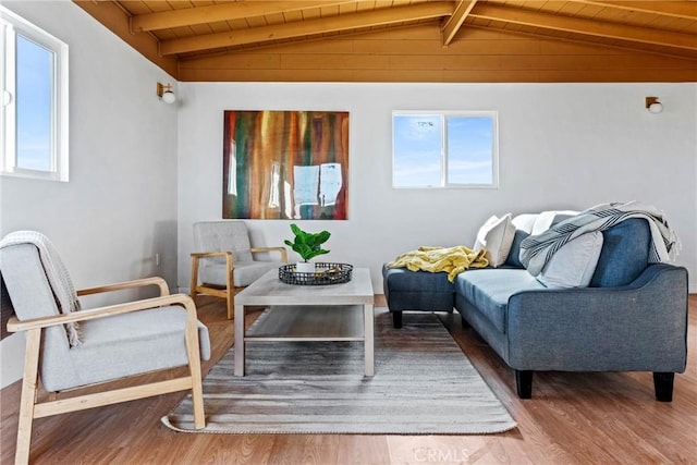 interior space featuring wood ceiling, vaulted ceiling with beams, and wood finished floors