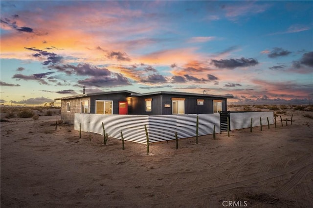 view of property exterior at dusk