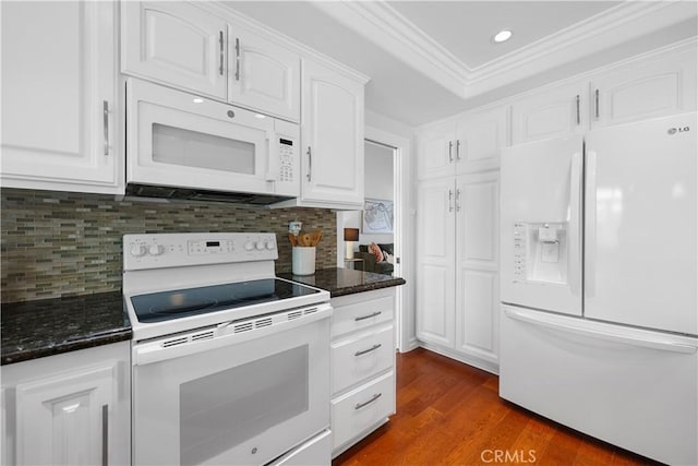 kitchen featuring crown molding, white appliances, dark wood-type flooring, dark stone counters, and white cabinets