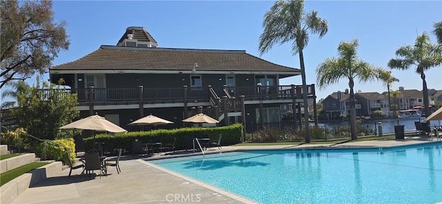 pool featuring a patio area