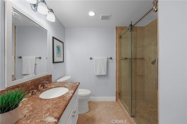full bath featuring visible vents, a shower stall, vanity, tile patterned floors, and toilet