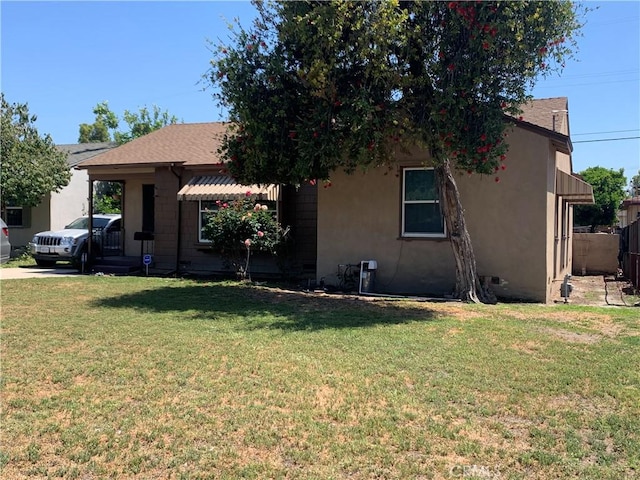 view of front of property with fence and a front yard