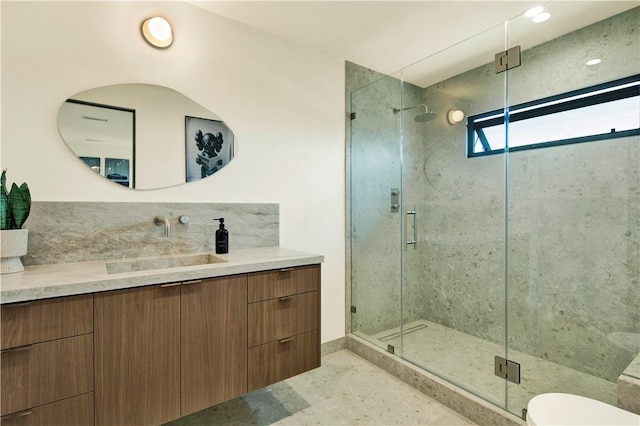 full bath featuring vanity, toilet, recessed lighting, tasteful backsplash, and a stall shower