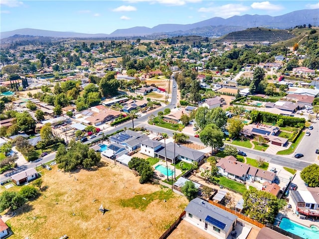 bird's eye view with a mountain view and a residential view