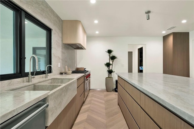 kitchen featuring visible vents, recessed lighting, appliances with stainless steel finishes, and exhaust hood