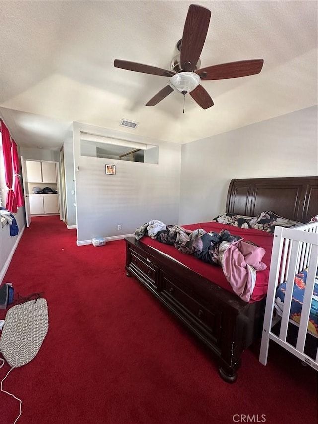 21205 Serra Unit 42, Lake Forest, CA 92630 - carpeted bedroom with baseboards, visible vents, and a ceiling fan