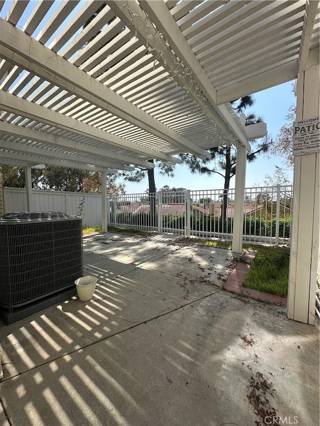 21205 Serra Unit 42, Lake Forest, CA 92630 - view of patio with a pergola, fence, and cooling unit