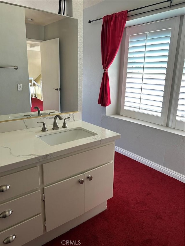 21205 Serra Unit 42, Lake Forest, CA 92630 - bathroom featuring vanity and baseboards