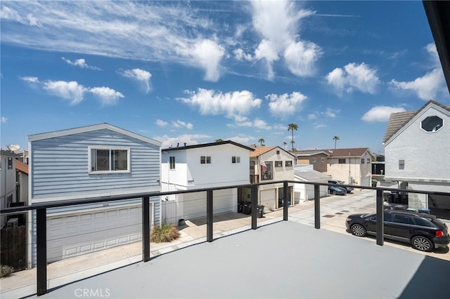 view of front of home featuring an attached garage and a residential view