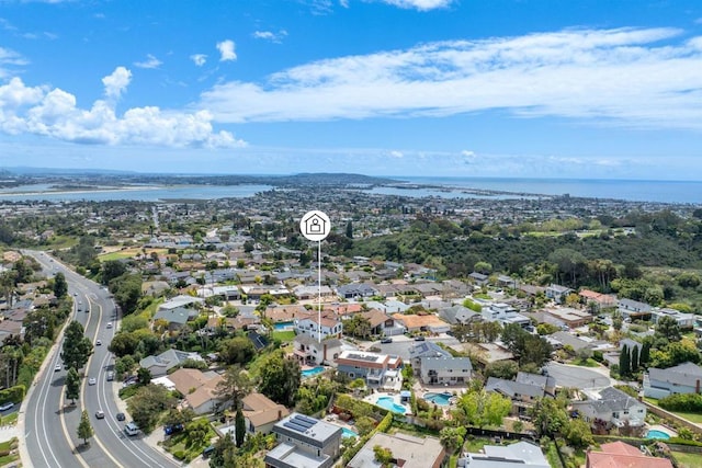 aerial view with a water view and a residential view