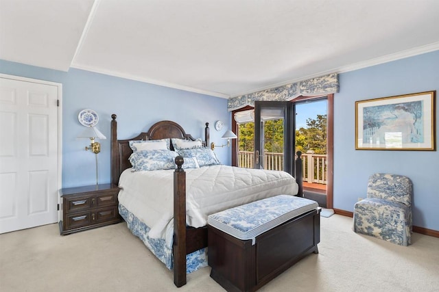 bedroom featuring baseboards, carpet flooring, ornamental molding, and access to exterior