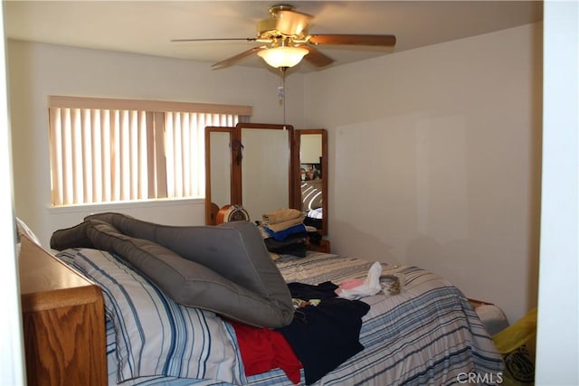 bedroom featuring ceiling fan