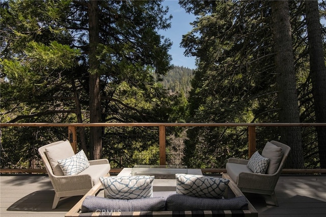 388 Primrose Cir, Lake Arrowhead, CA 92352 - deck featuring an outdoor living space and a view of trees