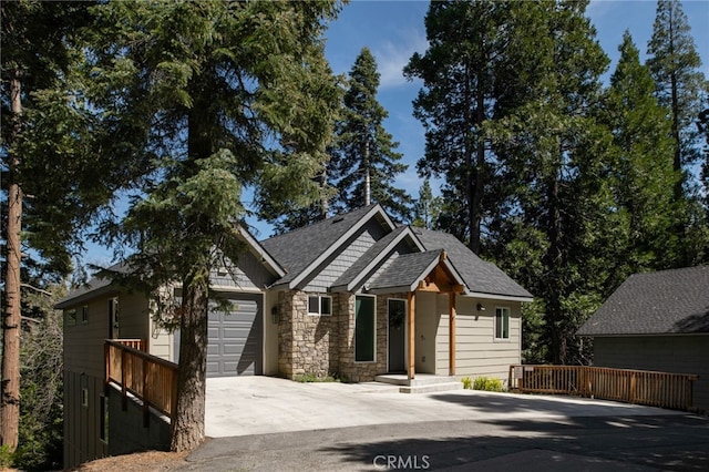 388 Primrose Cir, Lake Arrowhead, CA 92352 - craftsman house with a garage, a shingled roof, concrete driveway, and stone siding