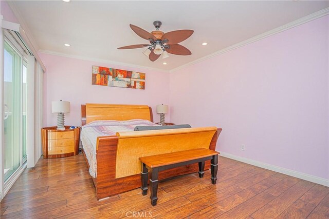 bedroom featuring crown molding, recessed lighting, and wood finished floors