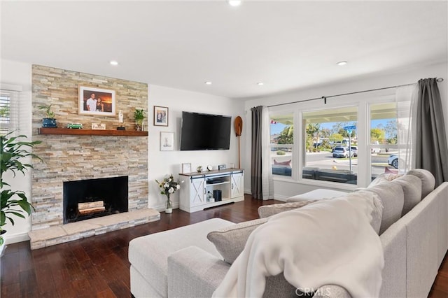 living area featuring plenty of natural light and wood-type flooring