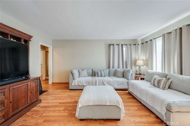 living area with light wood-style flooring