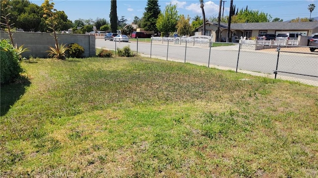 view of yard with fence