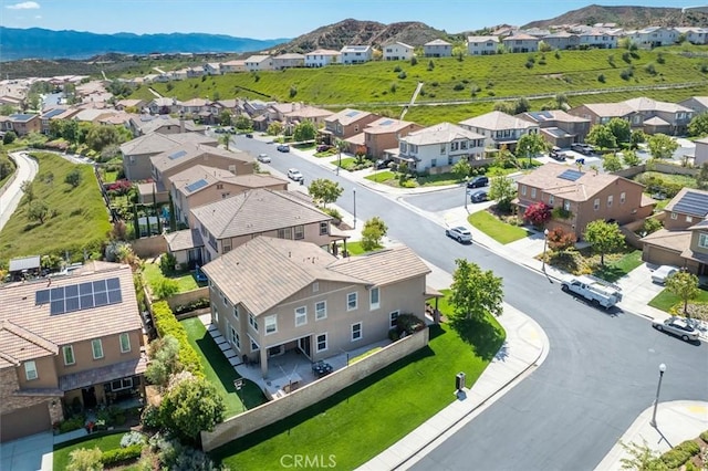 bird's eye view featuring a residential view and a mountain view