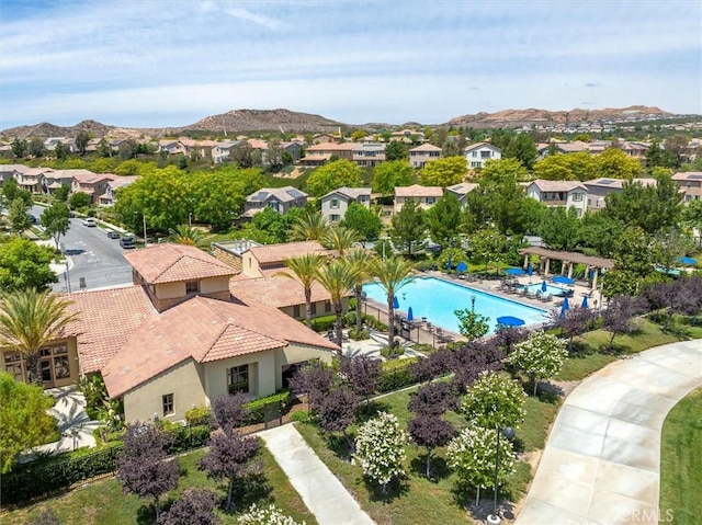 aerial view featuring a mountain view and a residential view