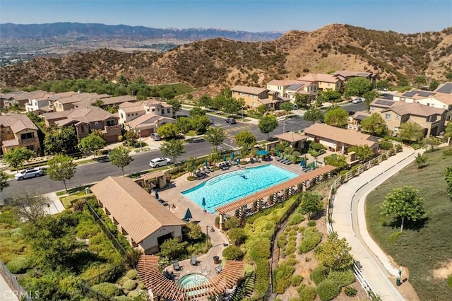 bird's eye view with a residential view and a mountain view
