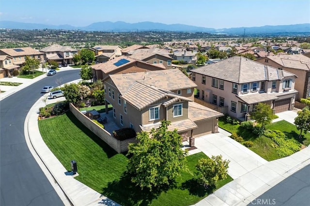 bird's eye view with a residential view and a mountain view