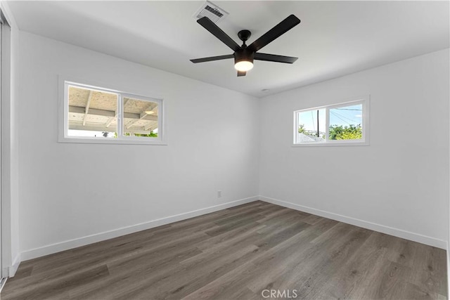1233 Oakhurst Dr, San Bernardino, CA 92404 - empty room with wood finished floors, baseboards, and ceiling fan