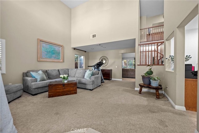 46140 Grace Ct, Temecula, CA 92592 - carpeted living area featuring baseboards and a high ceiling