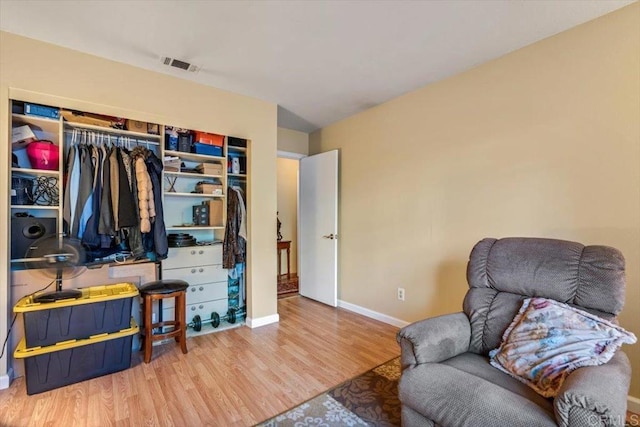 1315 Hermana Ct, Vista, CA 92084 - sitting room with wood finished floors and baseboards